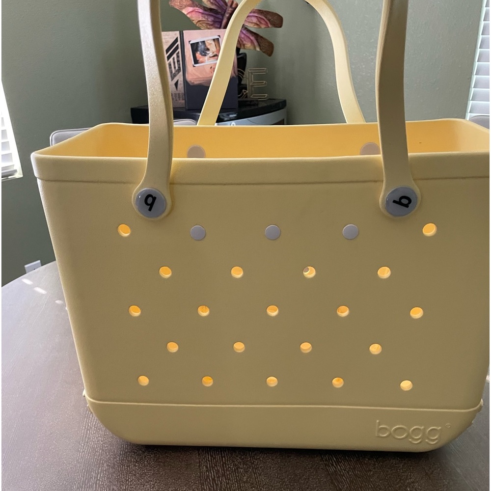 Bogg bag color is banana. Never used original X-Large.